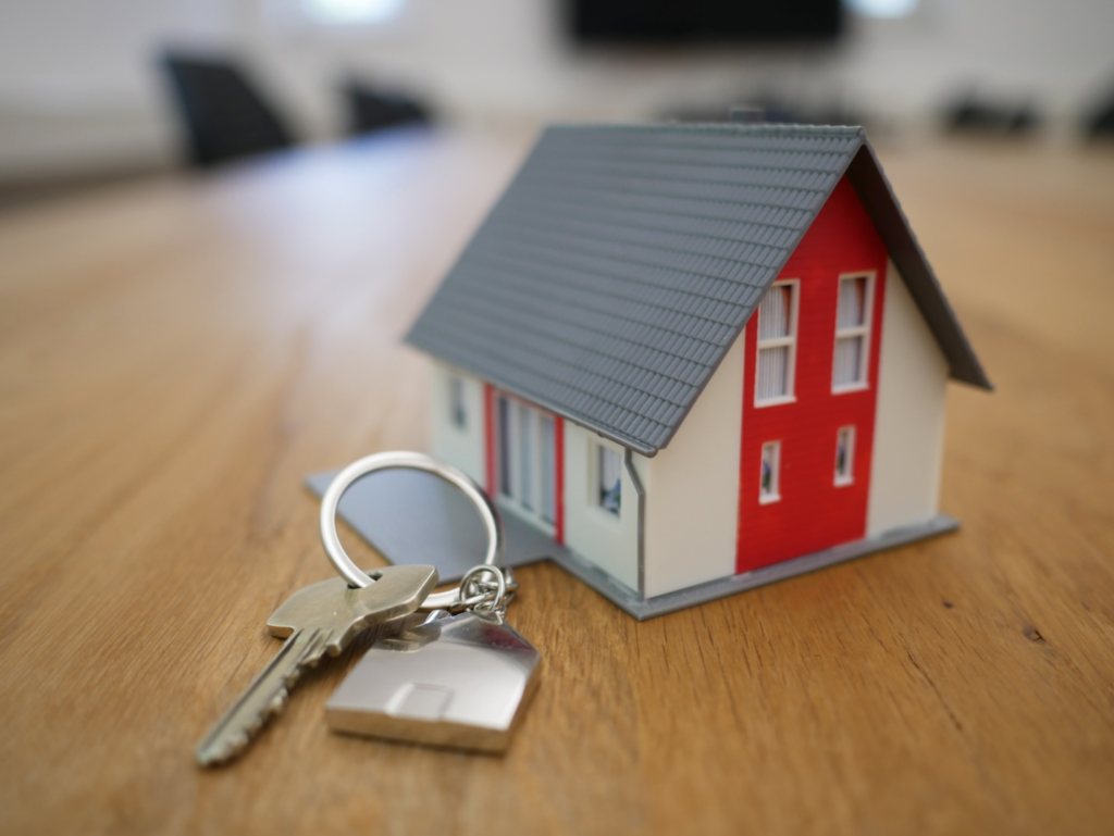 a small model of a house with keys