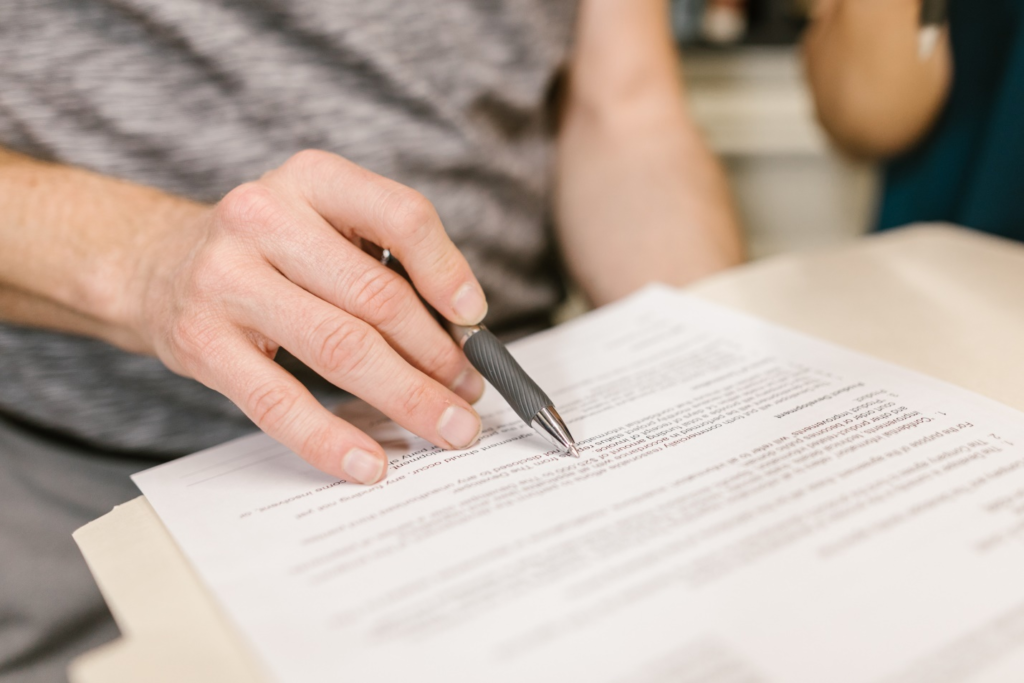 person reading a lease agreement 