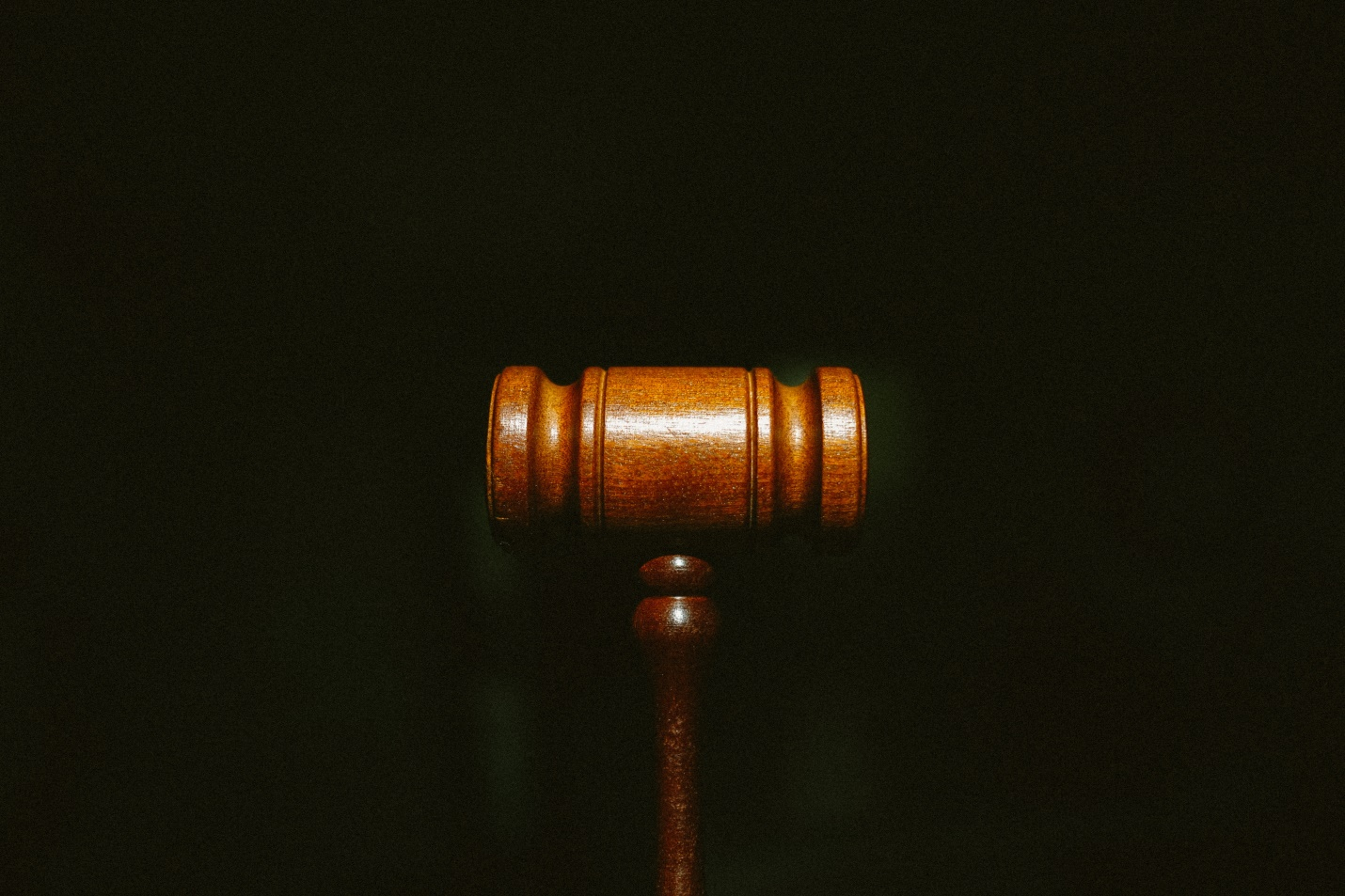 a brown wooden gavel used by a court judge